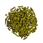 Close-up of green alfalfa pellets on a white background for animal feed