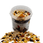 Tub of Galian tropical fruit mix for pet birds with dried fruit pieces spilled around