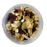 Clear plastic container filled with mixed dried tropical fruits including banana, pineapple, coconut, and papaya pieces