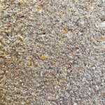 close-up of mixed granular poultry feed with grains and meal for laying hens