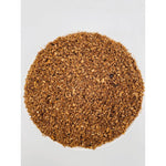 Close-up of 10 kg coarse universal pâté pet food in a white bowl on white background