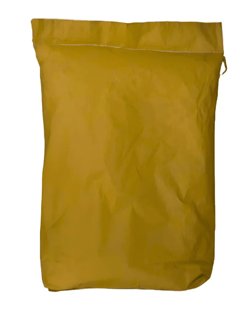 25 kg sealed yellow industrial bag on white background