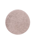 Close-up of fine light pink mineral powder on a plain background