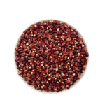 Close-up of a white bowl filled with dark red corn kernels on a white background