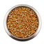Metal bowl filled with yellow popcorn kernels on white background